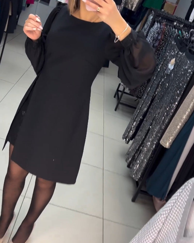 Gelaagde Mini-Jurk Met Transparante Ballonmouwen En Splitvoorkant – Een Edgy Statement Voor Avondjes Uit