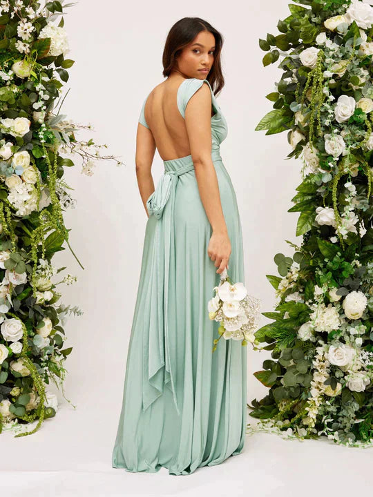 Lange Damesjurk Met Diepe V-Hals En Strikdetail – Elegante Avondjurk Met Chique Flair