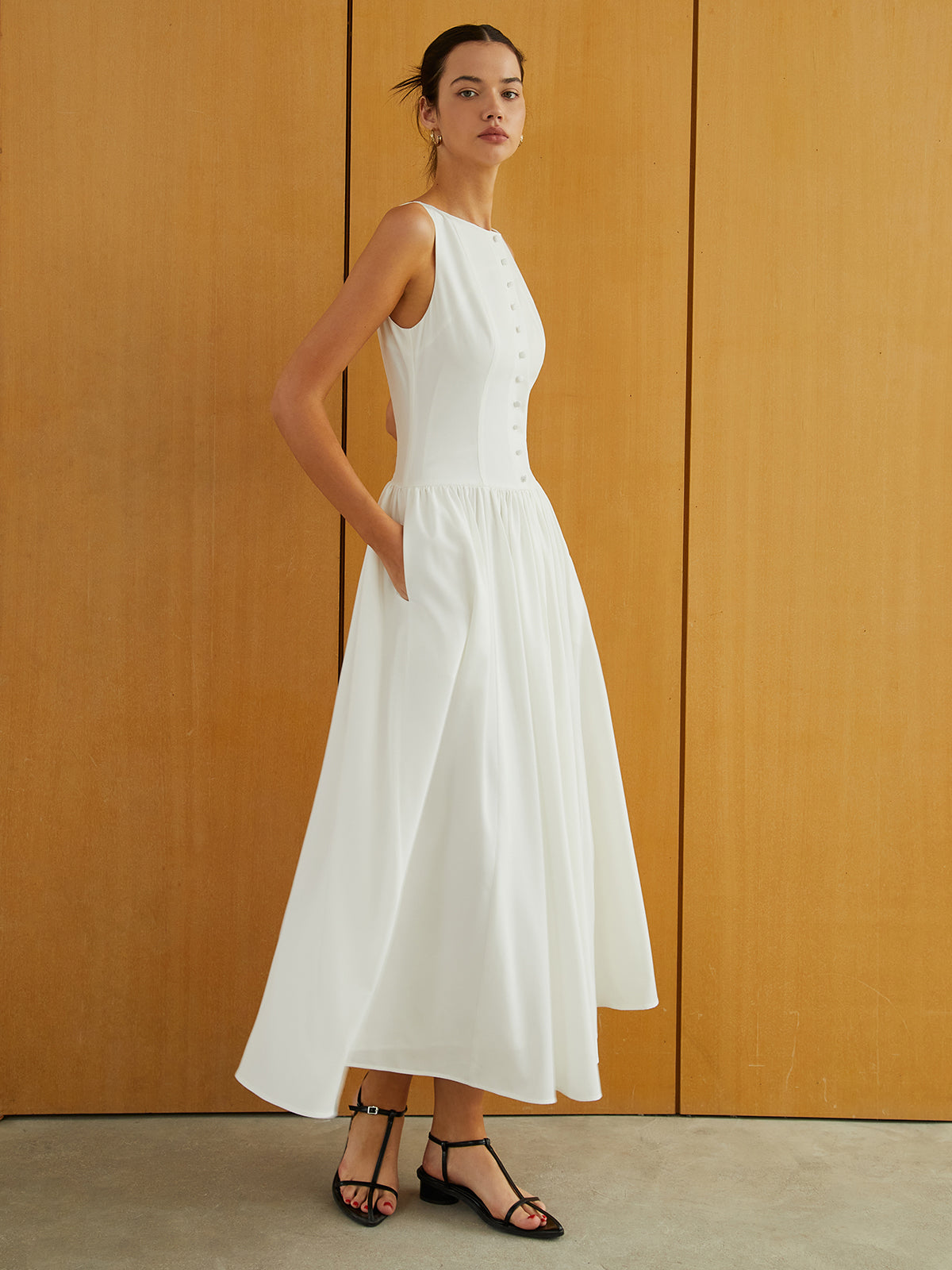 Elegante Mouwloze Lange Jurk Voor Modebewuste Vrouwen – Met Praktische Zakken, Eigentijdse Knopsluiting & Ideaal Voor Speciale Gelegenheden.