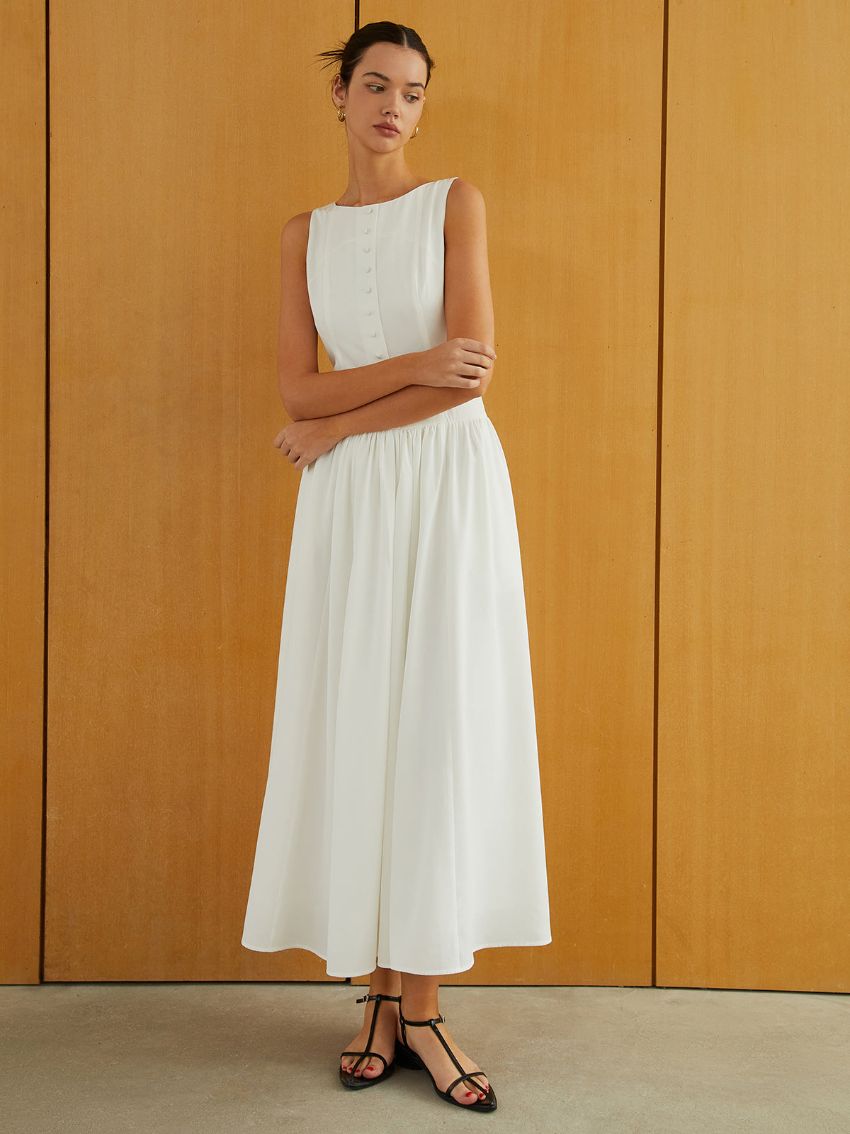 Elegante Mouwloze Lange Jurk Voor Modebewuste Vrouwen – Met Praktische Zakken, Eigentijdse Knopsluiting & Ideaal Voor Speciale Gelegenheden.