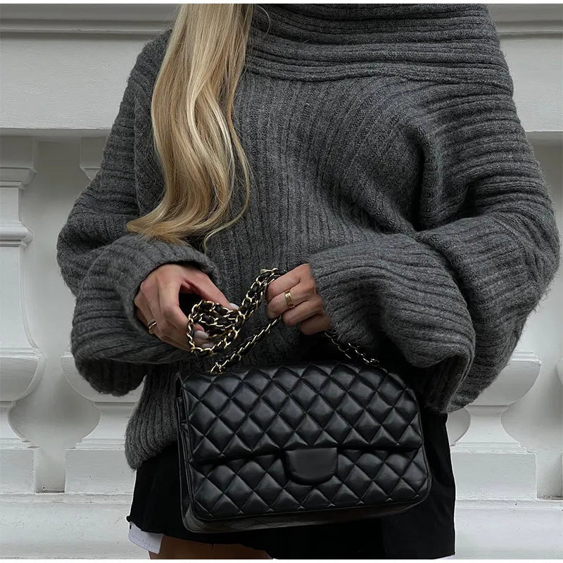 Grofgebreide Off-Shoulder Trui – Pure Knitwear Verleiding Met High-End Allure