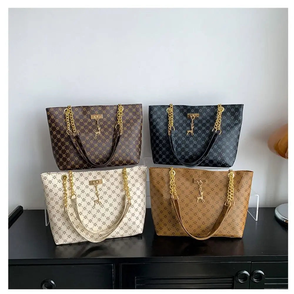 Luxe schoudertas voor dames – elegant patroon, gouden kettinghengsels & ruime indeling