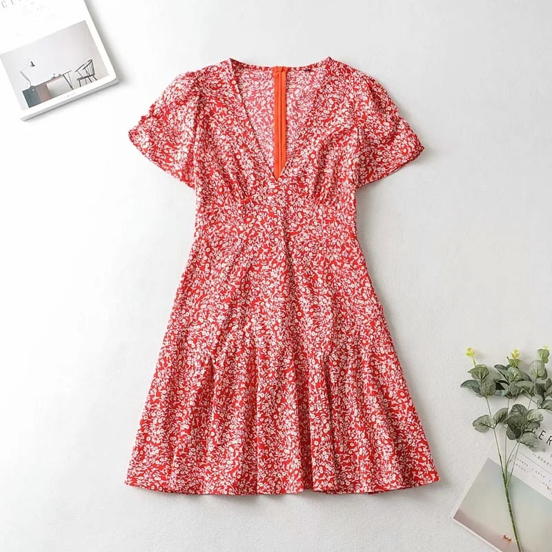 Bloemenprint Wikkeljurk Met V-Hals En Rufflezoom – Zomerse Charme In Een Speels Design