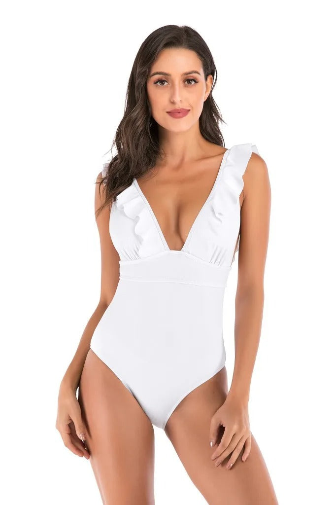 Badpak met diepe V-hals en ruches voor dames – flatterend model, stevige voering & zomerse allure