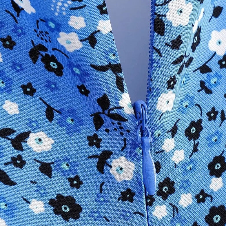 Bloemenprint Wikkeljurk Met V-Hals En Rufflezoom – Zomerse Charme In Een Speels Design