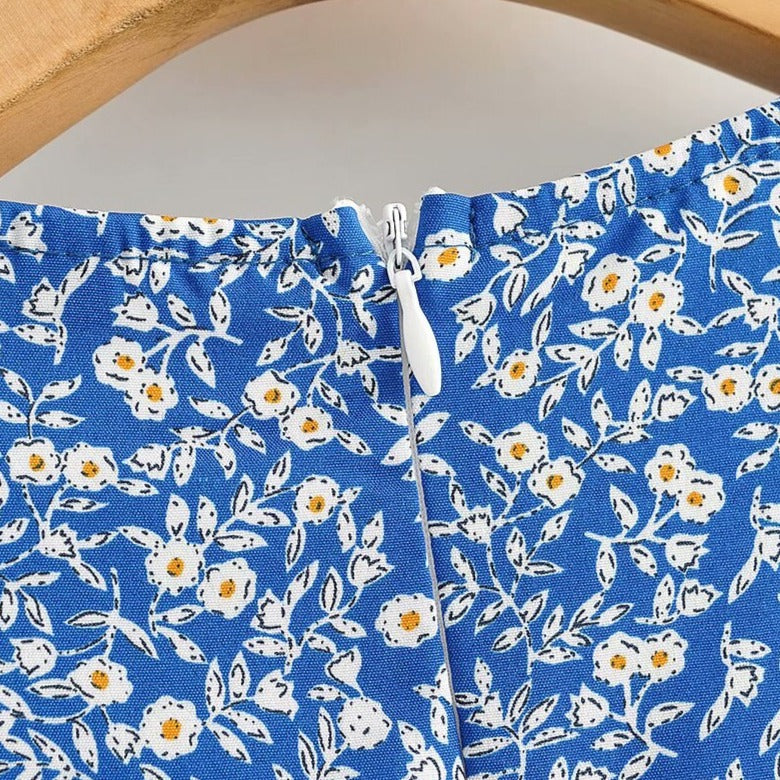 Bloemenprint Wikkeljurk Met V-Hals En Rufflezoom – Zomerse Charme In Een Speels Design