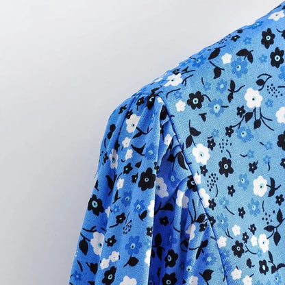 Bloemenprint Wikkeljurk Met V-Hals En Rufflezoom – Zomerse Charme In Een Speels Design