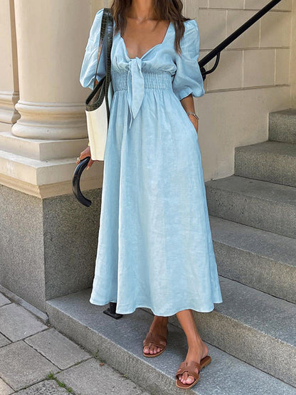 Zomerse Midi Jurk Voor Dames – Van Linnen En Katoen, Elegante Strikdetails & Perfect Voor Fijne Zomerdagen En Avondjes Uit.