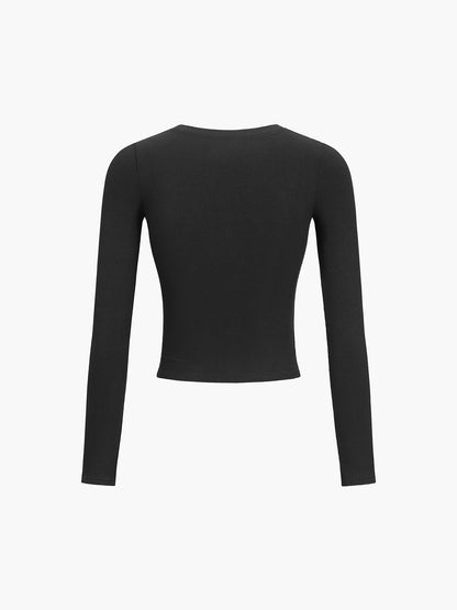 Aansluitende Dames Longsleeve Top – Ribstructuur, Knoopsluiting & Stretch Pasvorm
