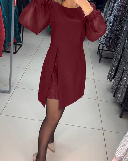 Gelaagde Mini-Jurk Met Transparante Ballonmouwen En Splitvoorkant – Een Edgy Statement Voor Avondjes Uit